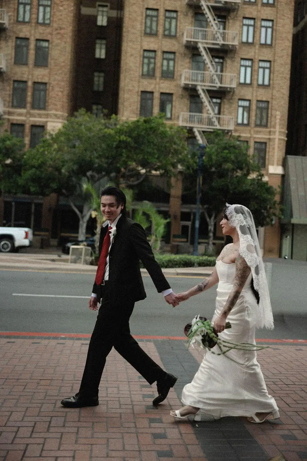 Downtown San Diego elopement photography in the Gaslamp Quarter by Cinematica Weddings.