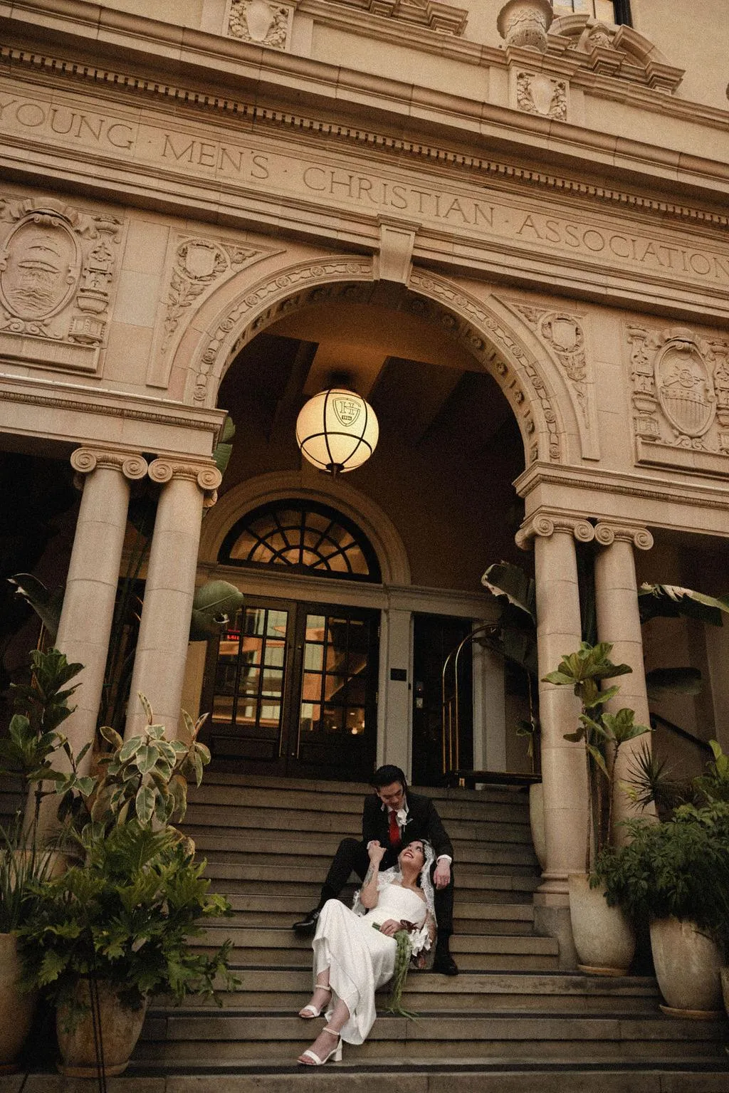 Leslie and Richard on the steps of a historic Gaslamp Quarter building in downtown San Diego.