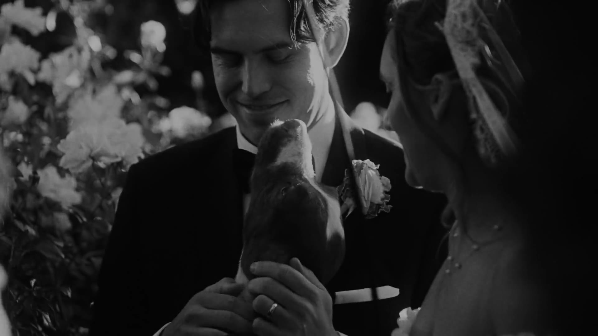 Black and white film frame of a bride and groom at Falkner Winery